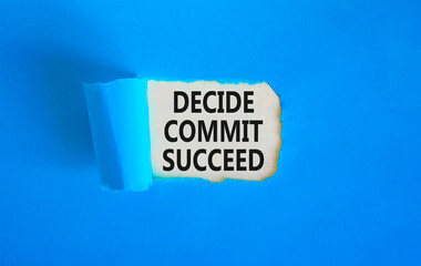Decide commit succeed symbol. Concept word Decide Commit Succeed on beautiful white paper. Beautiful blue table blue background. Business decide commit succeed concept. Copy space.