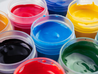 Jars of acrylic gouache paint art painting creativity and development