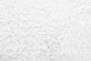 White shower towel texture. Fluffy carpet background. Blank bathroom textile. Warm sweater natural...