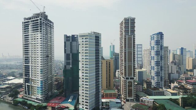 The Binondo district, a residential district under development located on the bank of the Pasig River in Metro Manila, the capital of Philippines. Aerial drone video.