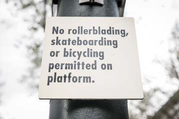 No rollerblading, skateboarding or bicycling permitted on platform sign