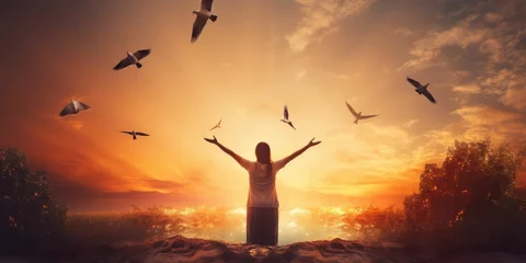 Foto op Plexiglas Woman praying and free bird enjoying nature on sunset background © Creative Canvas