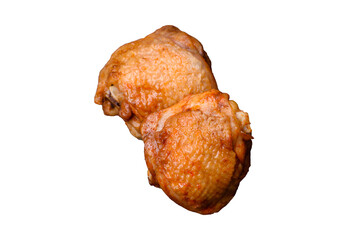 Delicious juicy chicken thighs baked with salt, spices and herbs in a ceramic plate