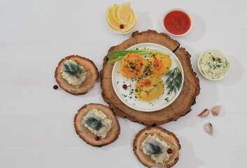 Fish sandwiches, potatoes, sauce. Healthy eating. Lifestyle. View from above. Flat lay.