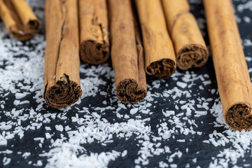 dried coconut shavings on a slate board