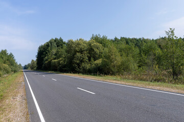 Fototapeta premium Narrow paved road for cars