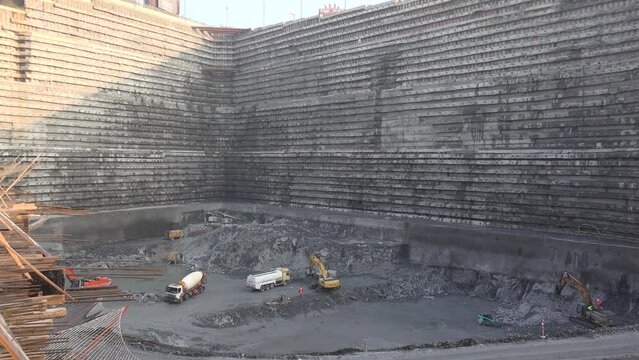image of retaining wall construction and working workers