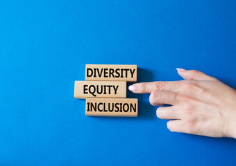 Diversity Equity Inclusion symbol. Concept words Diversity Equity Inclusion on wooden blocks....