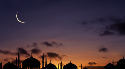Islamic Background, Silhouette Mosques Dome,Crescent Moon on Dusk Sky Twilight,Landscape Sunset Sky,Symbols for Islamic religion on Ramadan Kareem,Eid Al Fitr,Eid Al Adha,Eid Mubarak,Muharram,Mawlid © Anchalee