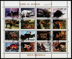 stamp set sheet printed in UMM-AL-QIWAIN (UAE) shows Different wild animals collection, circa 1972