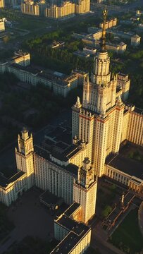 Flying over Moscow state university main campus in the sunny morning. Aerial view. Vertical Video