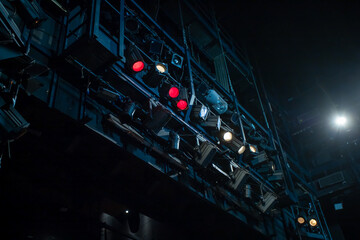 many theater spotlights above the stage