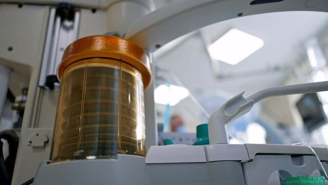 Working pump of lung ventilating machine. Low angle view on the equipment in surgery room.
