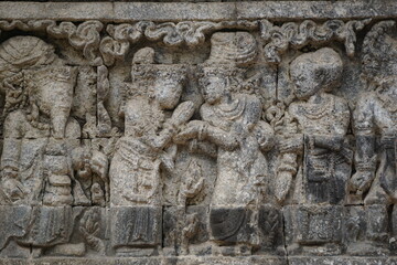 Fototapeta na wymiar Relief on the wall of Tegowangi temple in Kediri, East Java. This temple is the place for the Bhre Matahun Pendharmaan