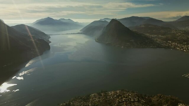 Lugano, Switzerland. Aerial view of the Swiss city, surrounded by lake and mount