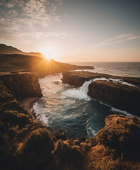 sunset over the ocean with waves crashing against the cliff side