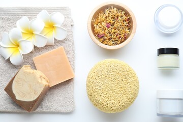 Bath accessories. Flat lay composition with personal care products on white background