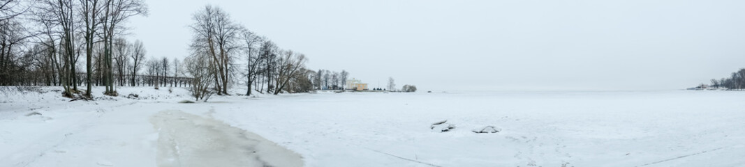 Frosty sea in winter, full of snow.