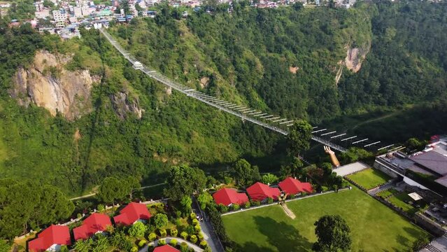 Kushma suspension bridge high above valley in Nepal 