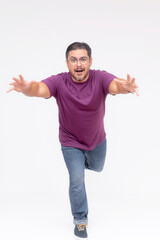 A middle aged man sprints trying to grab or reach something. Concept of rush sale, getting there in the nick of time. Full body photo, isolated on a white background.