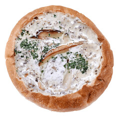 Mushroom cream soup served in bread bowl isolated photo from top view