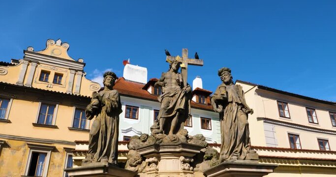 Statues of Saints Cosmas and Damian on Charles Bridge in Prague, Czech Republic