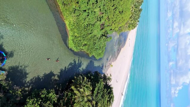 Vertical shot of tourism beaches and river in Los Patos, Barahona, Dominican Republic