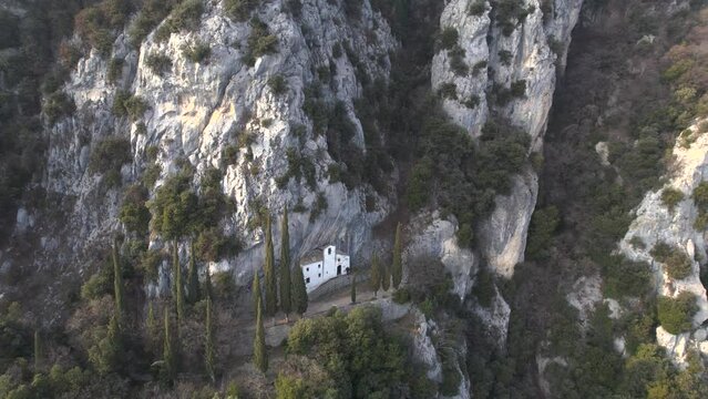 Drone shot showcasing Eremo di San Valentino and Cima Comer, two popular destinations for hikers on Lake Garda