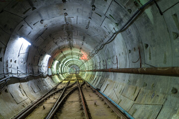 Soft focus of Underground tunnel infrastructure. Transport pipeline by Tunnel Boring Machine for...