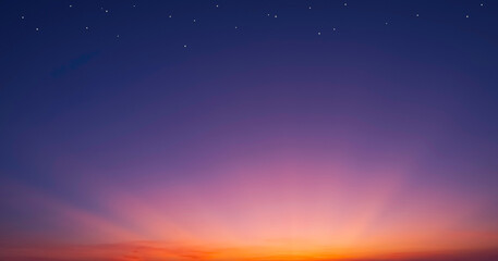 Dramatic twilight sky with stars and majestic colorful light on dark blue night sky background