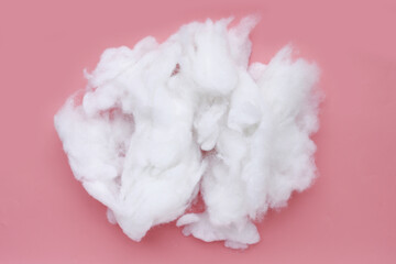 Polyester stable fiber on pink background.
