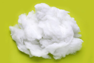 Polyester stable fiber on green background.