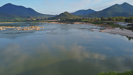 Fototapeta na wymiar The water in the Mekong River flows slowly in the morning