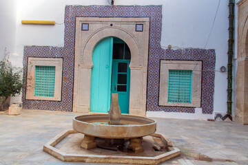 A Beautiful Arabesque Door with Two Windows from an Ancient Arabesque-Style House