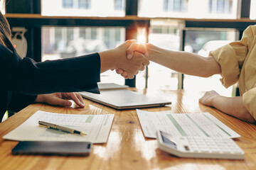 Thank you for letting me be part of the team. Cropped view of two businessmen shaking hands during meeting for success in job interview in business office Thank you partner, close-up photo - obrazy, fototapety, plakaty