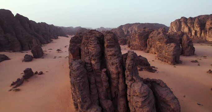 Large Sandstone Rock Formations In Tassili n'Ajjer National Park At Sunrise In Djanet, Algeria. - aerial shot