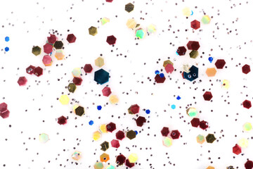 Close-up of multicolored sparkles, backdrop.