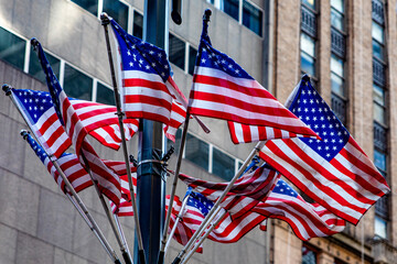 American flags on the lampposts of the Big Apple districts, as well as all over Manhattan, New York, in the United States of America.