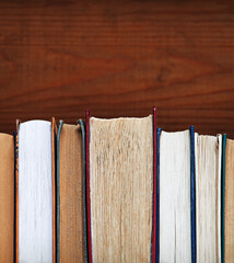 Old books on shelf. Ancient background