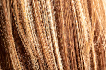 Highlighted women's hair as a background. Texture