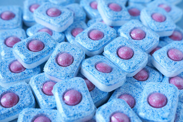 Dishwasher Tablets. A close-up of a large quantity of Dishwasher Tablets.