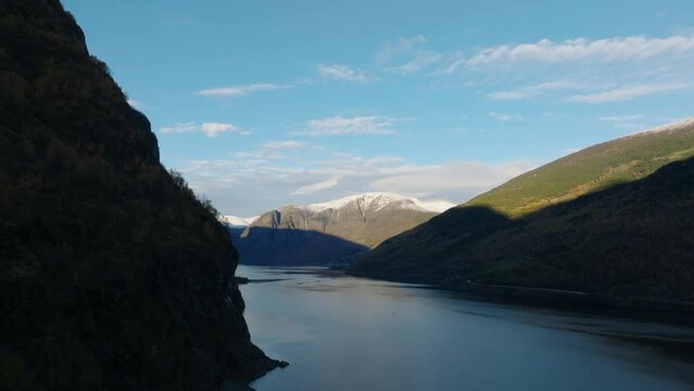 aerial view of aurlandsfjord fjord from flam station with mountains in snow in norway during sunset