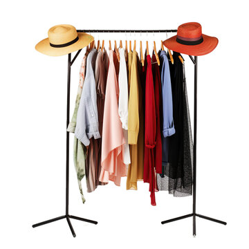 Wardrobe rack with different clothes and two hats
