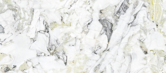 White marble background with golden spider veins on surface. High quality quartz stone marble for wall tile and kitchen tile ceramic surface. Polished satvario natural granite marbel with smooth.