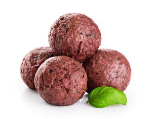 Fototapeta na wymiar Raw vegan meatballs with basil leaves isolated on white background. With clipping path.