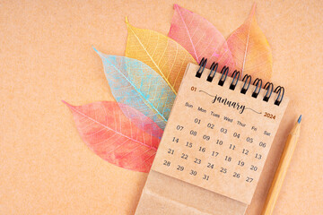 January 2024 monthly desk calendar and fiber structure of dry leaves texture, skeleton leaf.