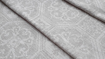 Fabric texture. Natural linen fabric. Linen. Ornament. Interweaving of fibers. Linen towels.