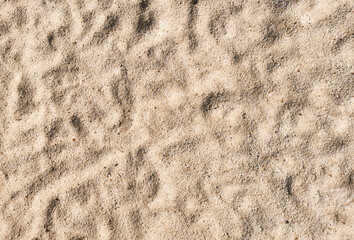 Fine sand with many foot step on beach