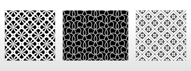 Geometric floral set of seamless patterns. White and black vector backgrounds. Damask graphic ornaments.