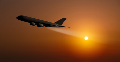 Passenger plane on the sunset sky background